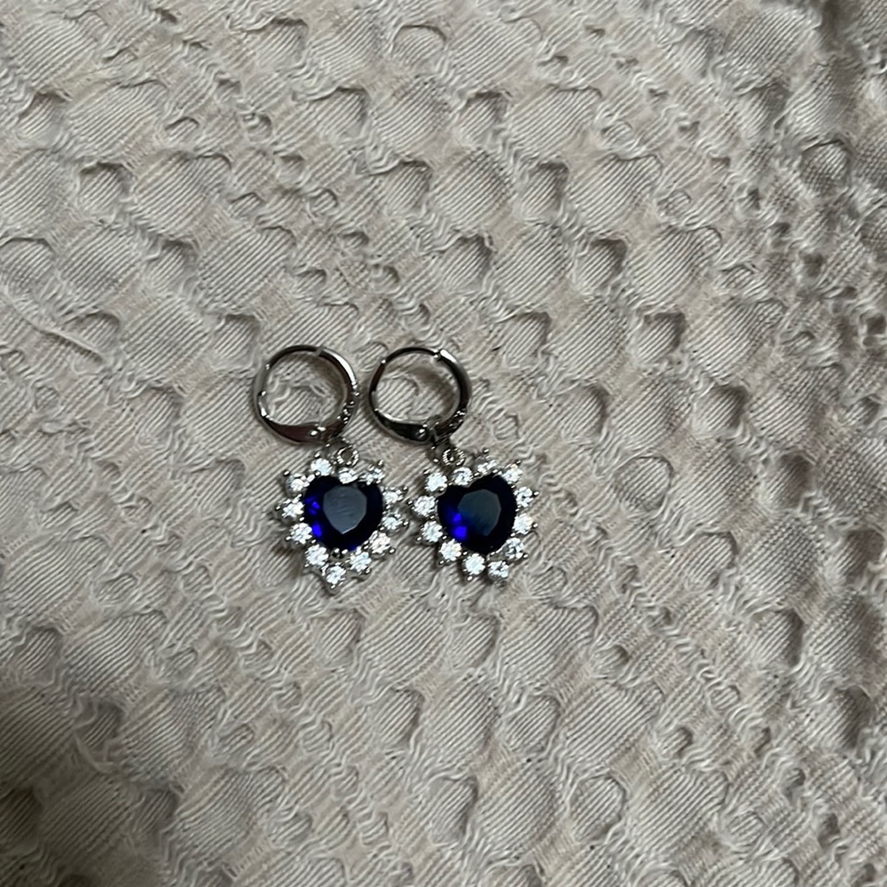 Silver heart shaped earring